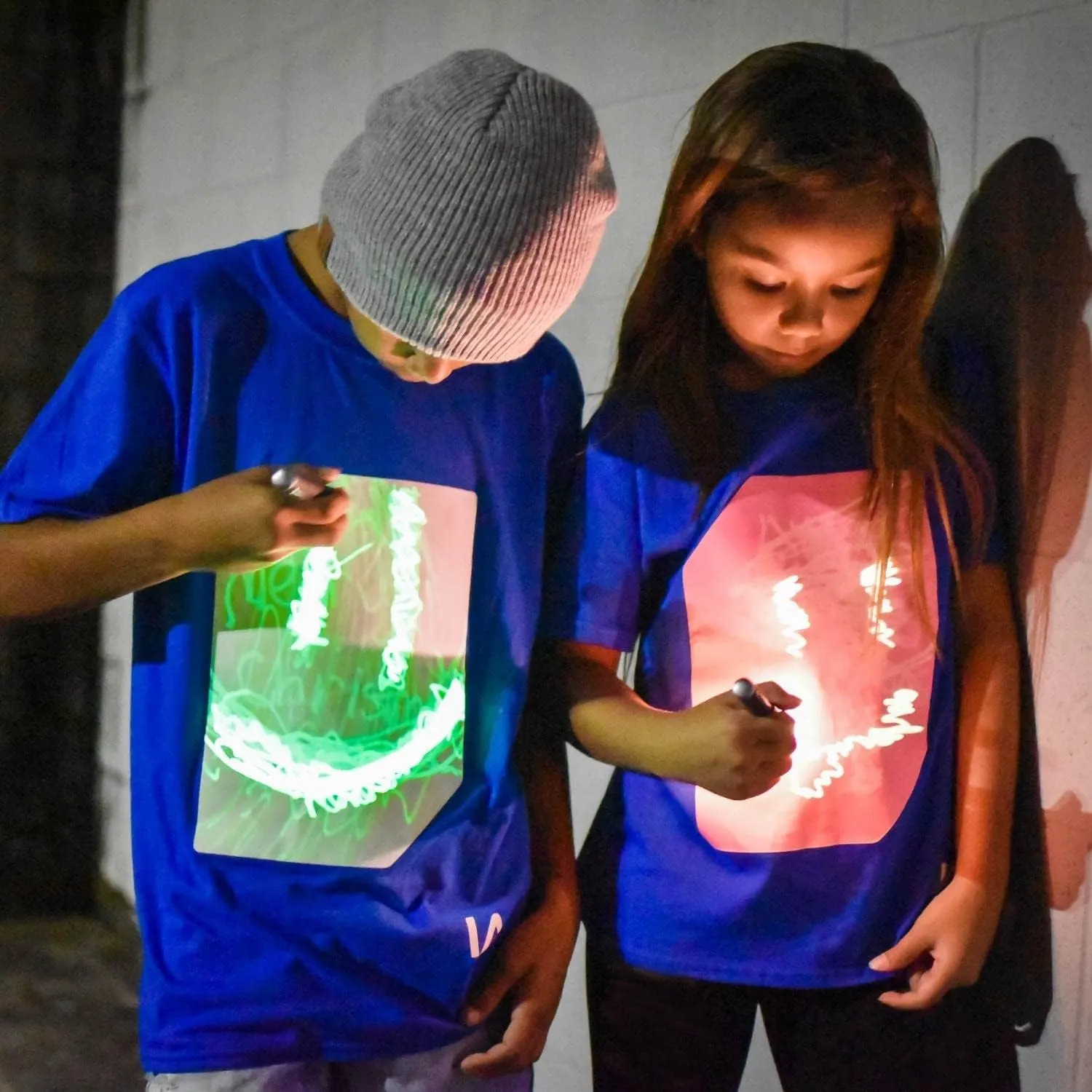 Illuminated Apparel Original Interactive Glow in The Dark T-Shirt - Fun for Birthday Parties & Festivals