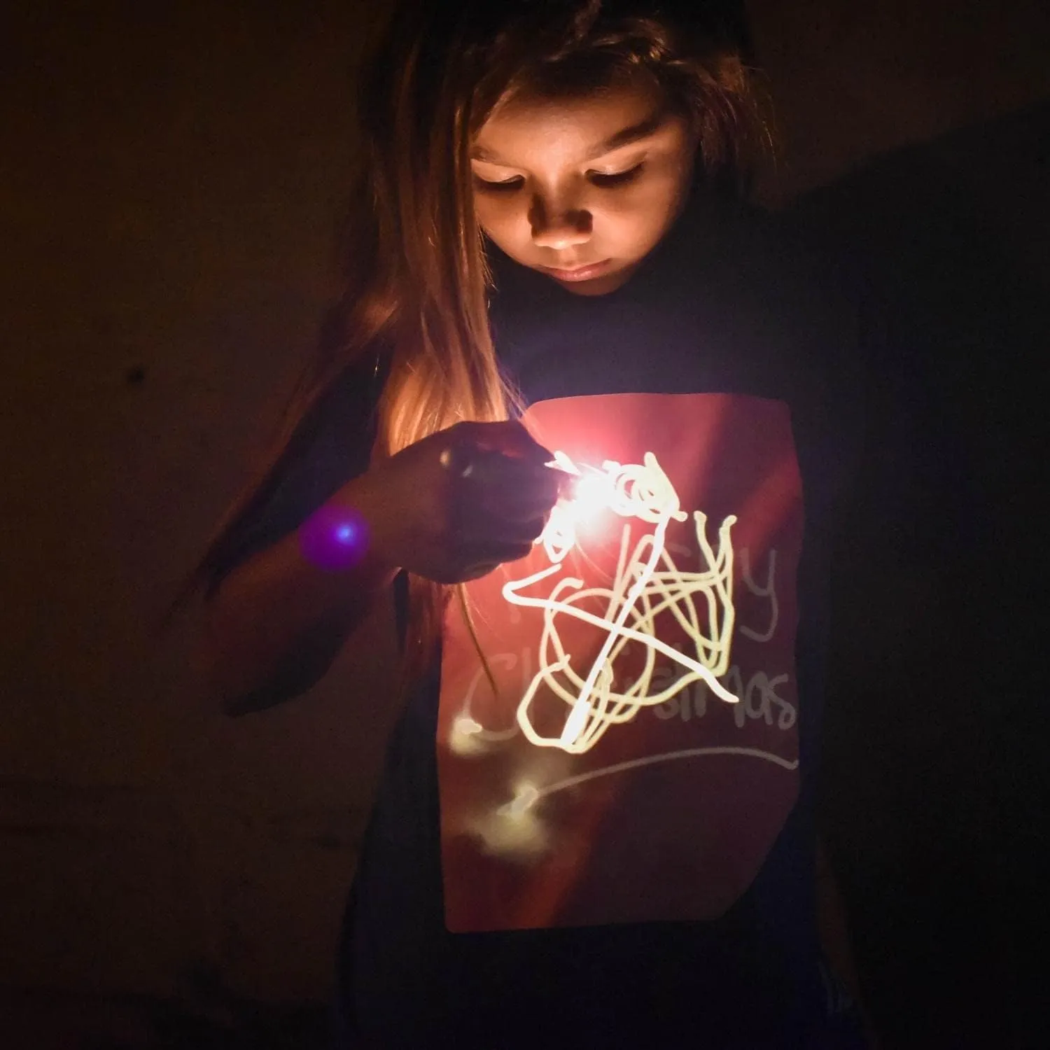 Illuminated Apparel Original Interactive Glow in The Dark T-Shirt - Fun for Birthday Parties & Festivals